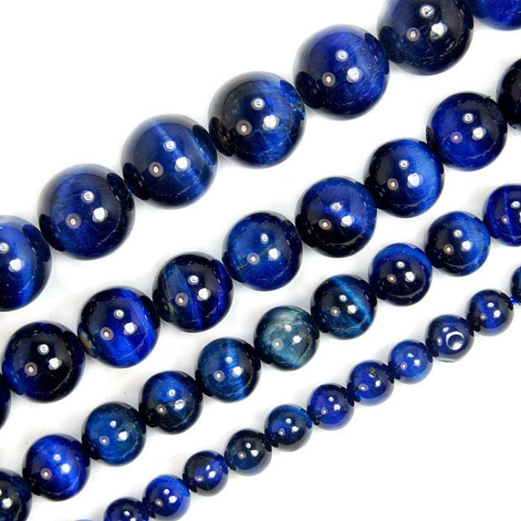 Dark blue Tiger Eye bead bracelet with silver pave spacer, 10mm beads, elastic strand.