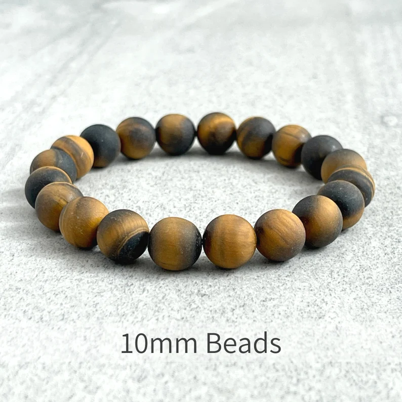 Matte Tiger Eye Bead Bracelet with 10mm beads and gold plated spacer.