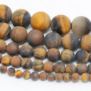 Matte Tiger Eye bead bracelet with gold plated spacer bead, handcrafted and elasticated.