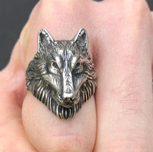 Stainless steel wolf head pattern ring with intricate design and bold style.