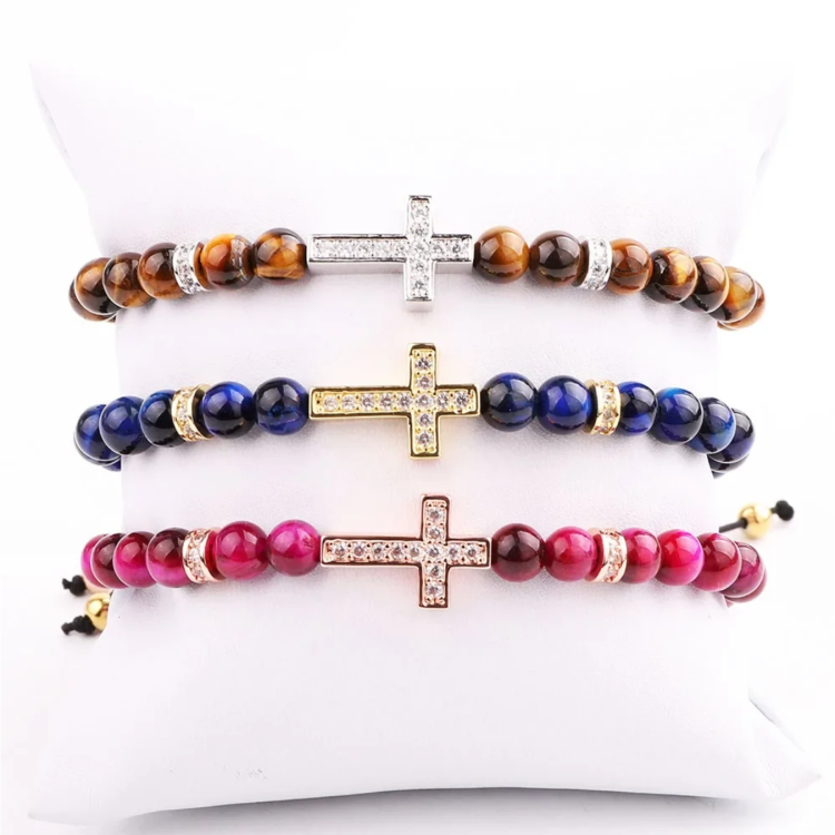 Natural 6mm Tiger Eye beaded bracelet with CZ cross charm, featuring macrame cord, by T.M.J. for stylish accessory wear.