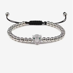 Luxury CZ diamond Puma charm macrame bead bracelet by T.M.J featuring intricate knot details and sparkling gemstone accents.