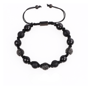 Natural stone onyx and tiger eye beaded macrame bracelet by T.M.J, featuring polished stone beads and intricate woven design.
