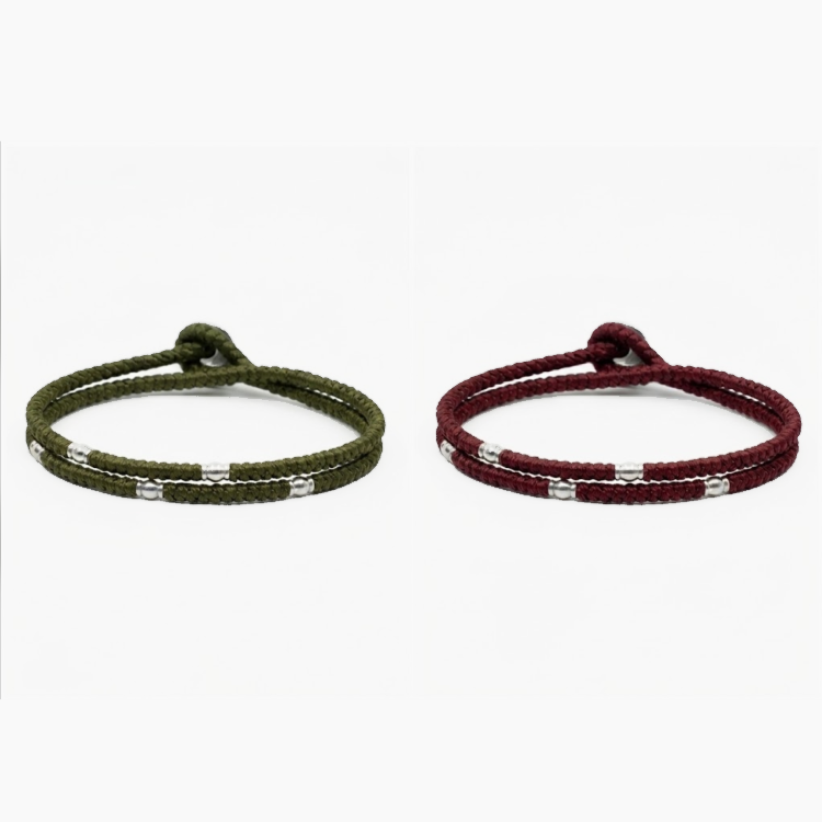Meridian braided cord bracelet in stainless steel, close-up of the beads and clasp