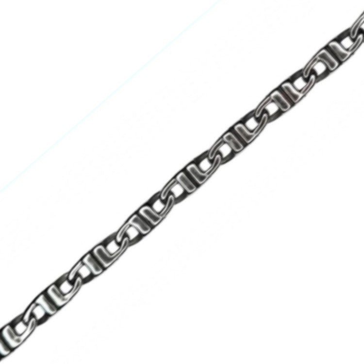 Stainless steel Meridian Balinese J-Link horseshoe bracelet by T.M.J, featuring intricate metal links and a polished finish.
