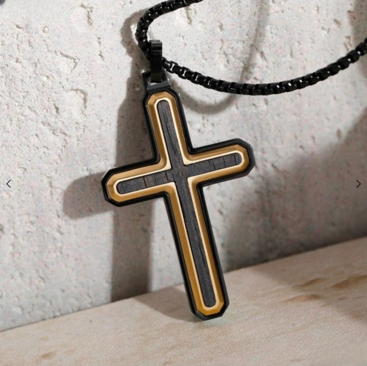 Callahan ebony wood cross pendant on gold and black PVD stainless steel chain, featuring a sleek, elegant design by Cudworth.