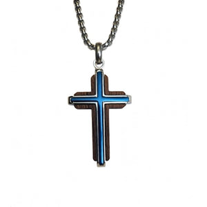 Dresden Black Walnut Cross by Cudworth featuring a channel-set blue steel accent in a detailed wooden cross design.