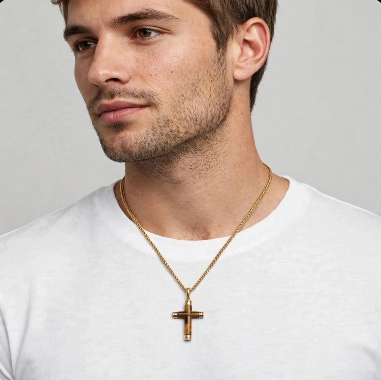 Kestrel Tiger's Eye cross pendant on gold PVD stainless steel necklace showcasing detailed cross design by Cudworth.