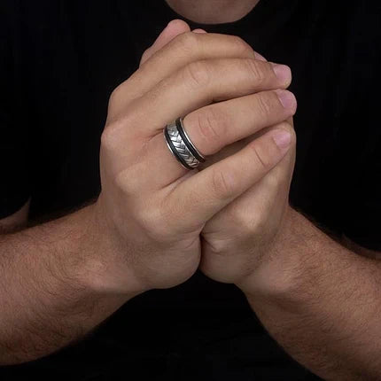 Hoxton silver men's ring with leather detail, showcasing a stylish band design and mixed metal accents.