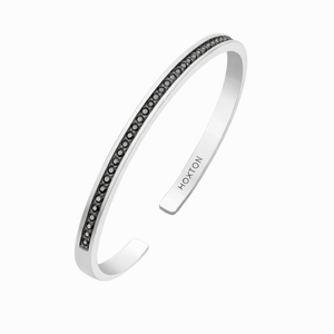 Hoxton London men's sterling silver bangle featuring a black sapphire set, stylish and elegant jewelry accessory.