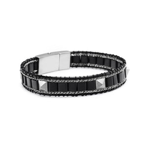 T.M.J Kairos black onyx bead bracelet with silver accents and lock, featuring polished black onyx beads and silver details.