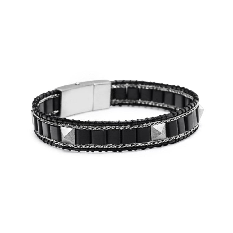 T.M.J Kairos black onyx bead bracelet with silver accents and lock, featuring polished black onyx beads and silver details.