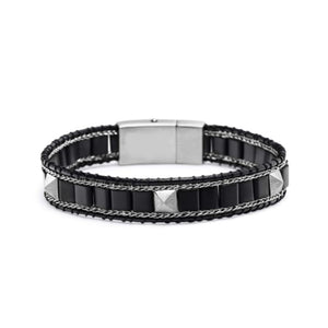 T.M.J Kairos black onyx beaded bracelet with silver accents and lock, featuring sleek black onyx beads and silver details.