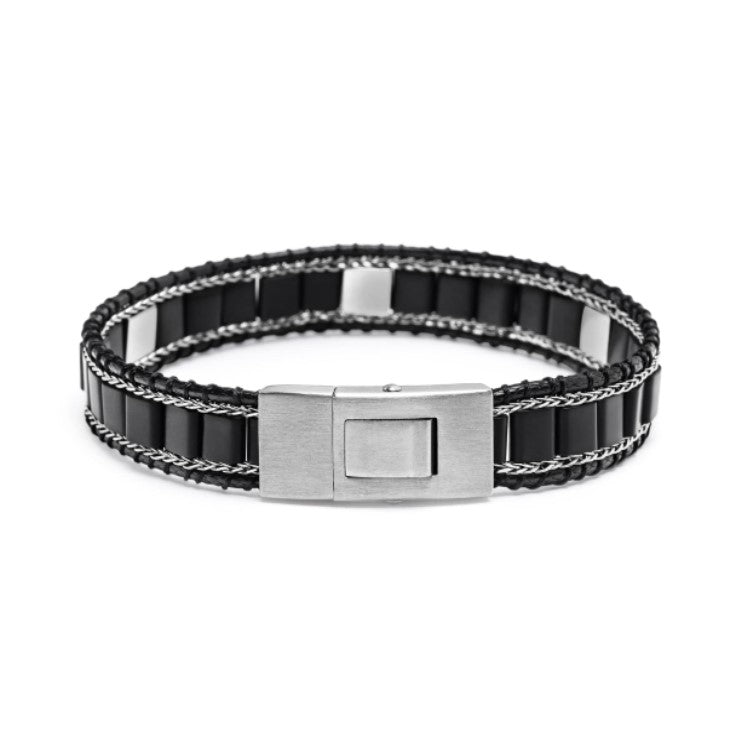 T.M.J Kairos black onyx bead bracelet with silver accents, featuring silver lock and polished black onyx beads for a stylish look.