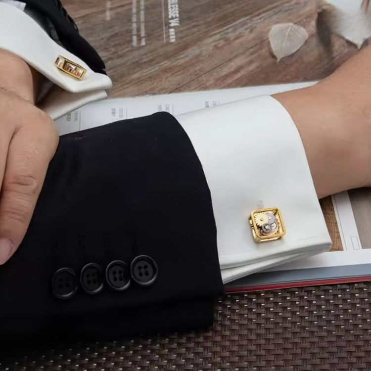T.M.J mechanical steampunk gear cufflinks on white shirt cuff with black suit jacket