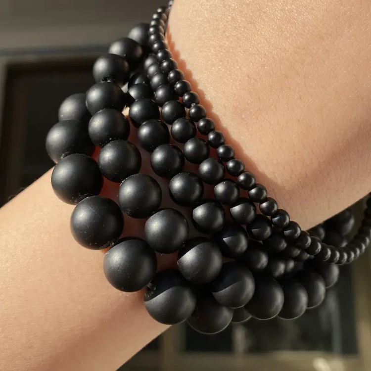 Black matte agate beaded bracelet by T.M.J featuring 4mm round beads on a 17cm elastic band.