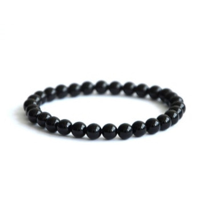 Black matte onyx and stainless steel bead bracelet with polished 4mm beads, 17cm length, by T.M.J, stylish and contemporary jewelry.