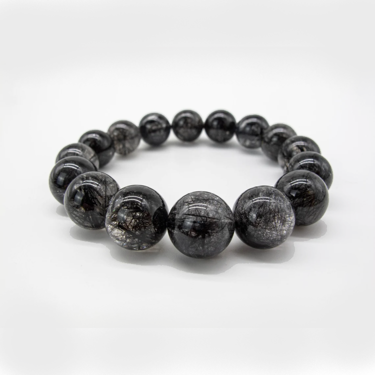 Black Rutilated Quartz bead bracelet by T.M.J, handmade in Melbourne, featuring 6mm round beads on a stylish 17cm bracelet.