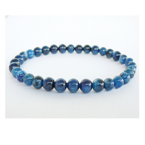 Dark blue Brazilian Kyanite crystal bead bracelet by T.M.J, featuring 6, 8, 10, and 12mm beads on a 17cm strand.