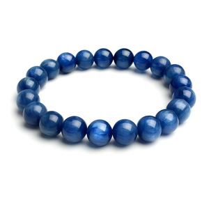 Dark blue Brazilian Kyanite crystal bead bracelet by T.M.J with round beads in sizes 6mm, 8mm, 10mm, and 12mm.
