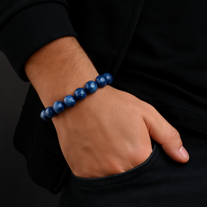 Dark blue Brazilian Kyanite crystal bead bracelet by T.M.J, featuring 6mm, 8mm, 10mm, and 12mm beads on a stretchy band.