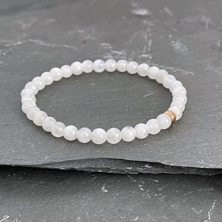 White Jadeite beaded bracelet by T.M.J featuring 6mm beads on a 17cm stretch bracelet for elegant jewelry.