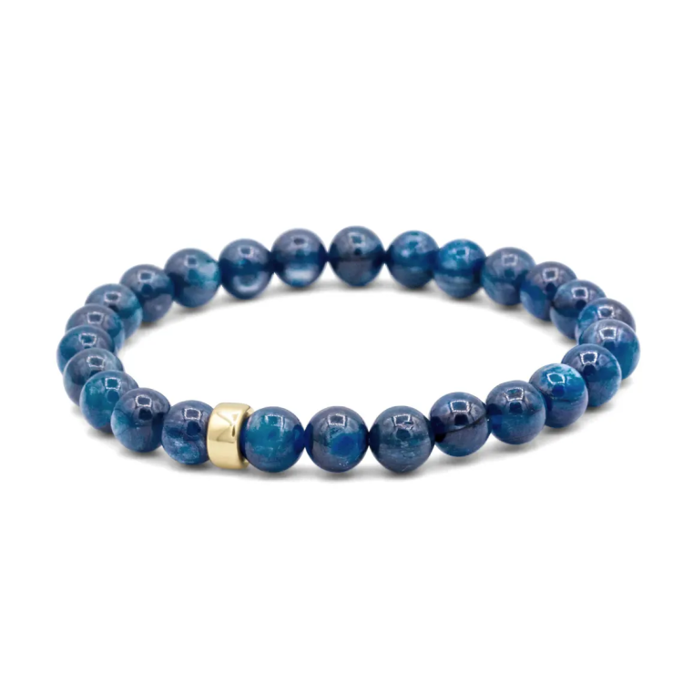 Dark blue 7.5mm Kyanite crystal beaded bracelet from T.M.J, featuring plain round beads on a stretch cord.
