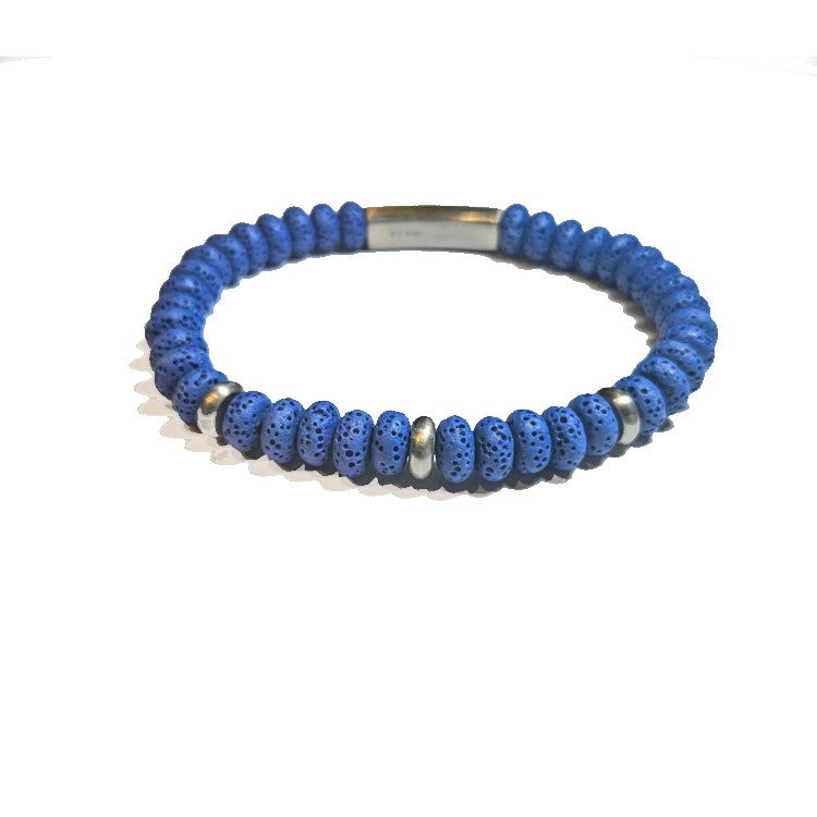 Black Eclipse Lava Bead Bracelet with stainless steel accent by T.M.J, featuring textured lava beads and sleek metal details.
