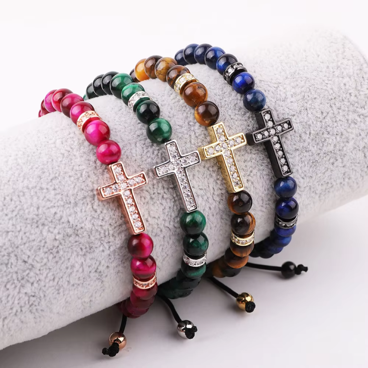 Natural 6mm stone beaded CZ cross charm macrame bracelet by T.M.J, featuring brown stones and intricate knot details.