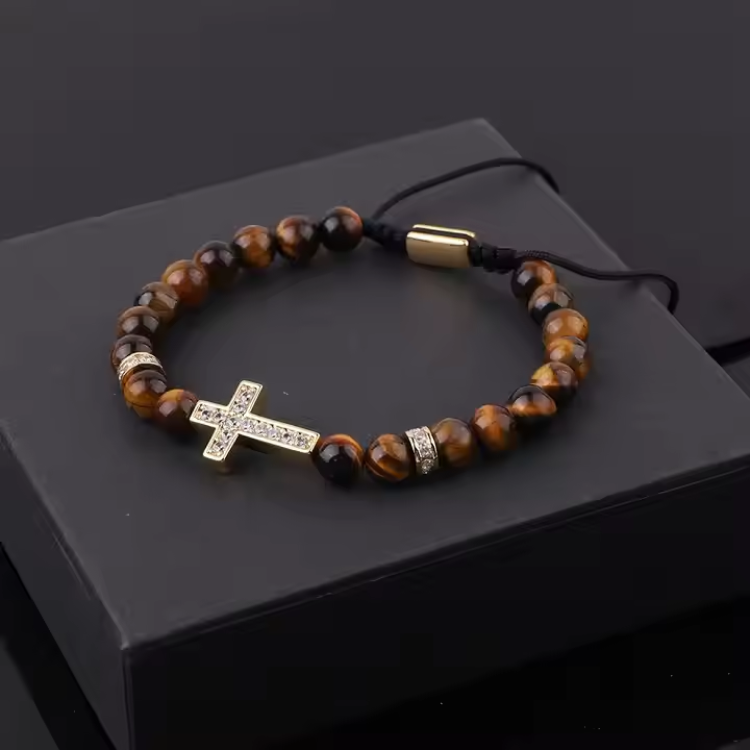 Natural 6mm stone beaded CZ cross charm macrame bracelet by T.M.J with brown beads and adjustable cord.