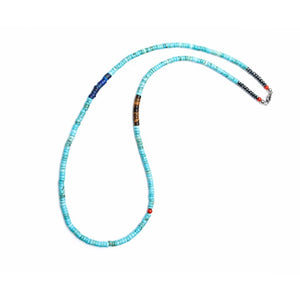 Turquoise heishi necklace from T.M.J Caribbean Collection featuring tiger eye and blue lapis beads, laid out on a neutral background.