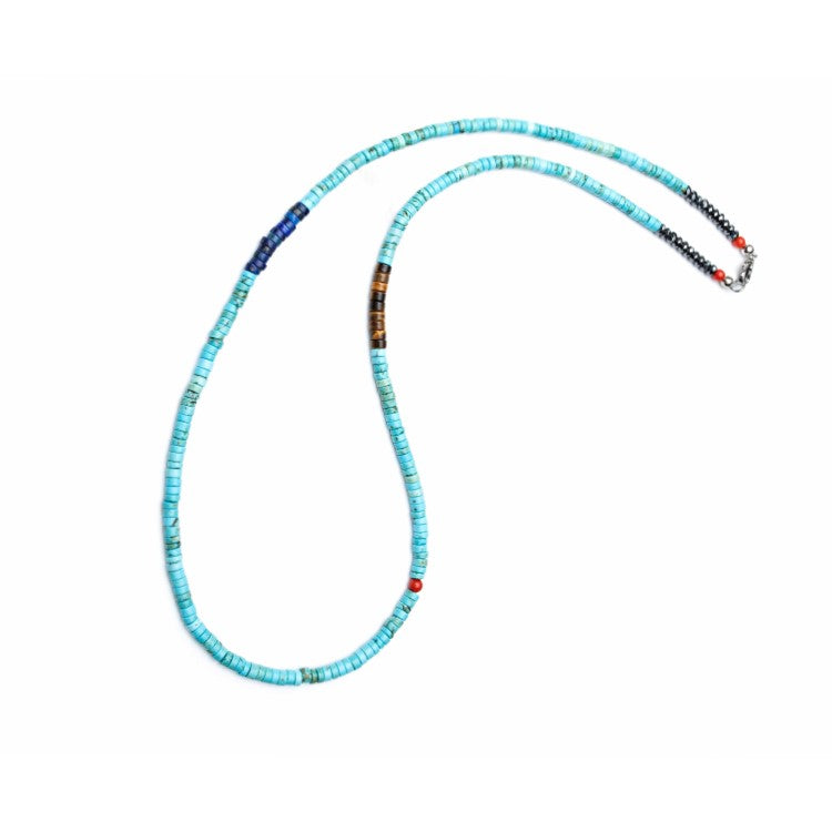 Turquoise heishi necklace from T.M.J Caribbean Collection featuring tiger eye and blue lapis beads, laid out on a neutral background.