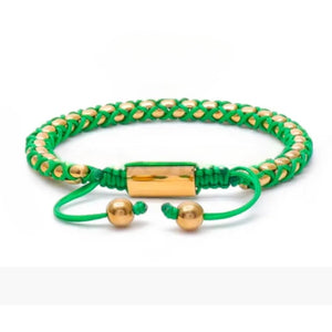 Crimson Weave SteelLink bracelet with braided emerald green cord, T.M.J bead bracelet featuring steel links and colorful woven design.
