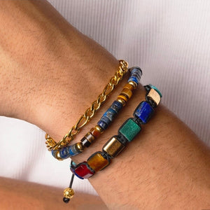Eye of Dharma Flatbead Collection gold bracelet with turquoise, tiger eye, and lapis lazuli beads from T.M.J.