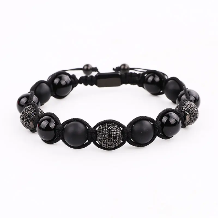 Black Onyx CZ crystal bead bracelet with macramé design, featuring protective stones and elegant craftsmanship by T.M.J.