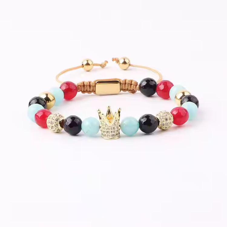 Red and blue stone CZ pave crown macrame bracelet by T.M.J, featuring beaded design with intricate knotwork.