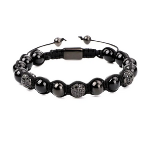 T.M.J natural stone beaded macrame bracelet featuring matte tiger eye and onyx beads, stylish and handcrafted jewelry accessory.