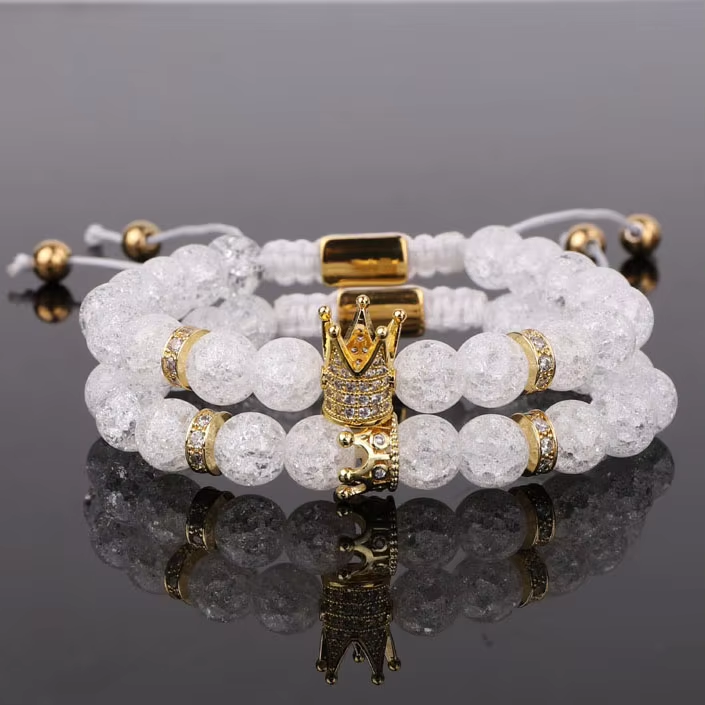 His and hers CZ Mirco pave crown charm bead bracelets with crack crystal stones, featuring beaded design by T.M.J.