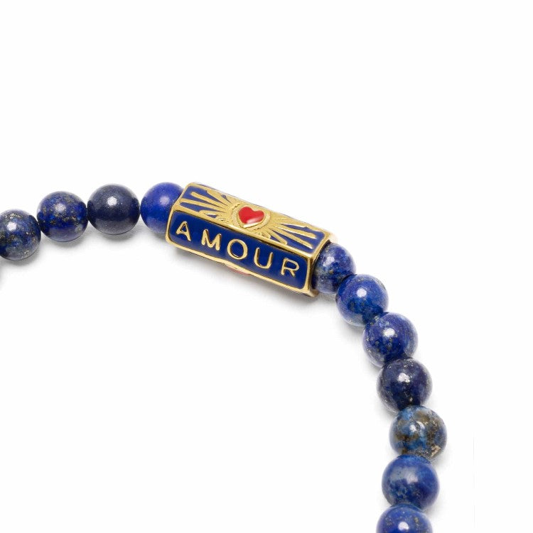 Blue lapis lazuli beaded bracelet by T.M.J, featuring 6mm beads and a stylish "Love" design in a natural, elegant style.