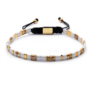 T.M.J Tila Link Macrame Beaded Bracelet with white gold Miyuki Tila beads, featuring intricate knot and bead details