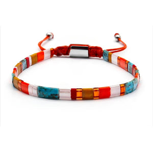 T.M.J Tila Link Macrame Bracelet with white gold Miyuki Tila beads, featuring intricate beadwork and stylish macrame design.