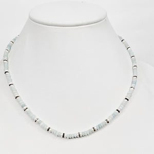 Mini beaded necklace by T.M.J with pearls and aquamarine jasper, featuring delicate beads and a stylish, handcrafted design.
