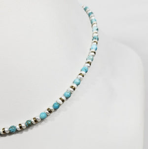Mini beaded necklace by T.M.J featuring pearls and turquoise beads, 45cm length, stylish and elegant jewelry accessory.