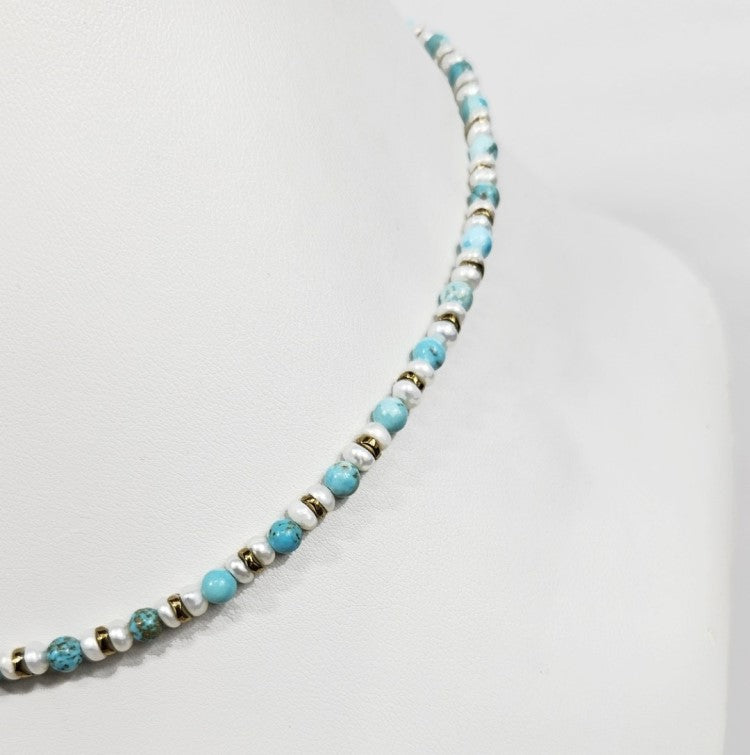 Mini beaded necklace by T.M.J featuring pearls and turquoise beads, 45cm length, stylish and elegant jewelry accessory.