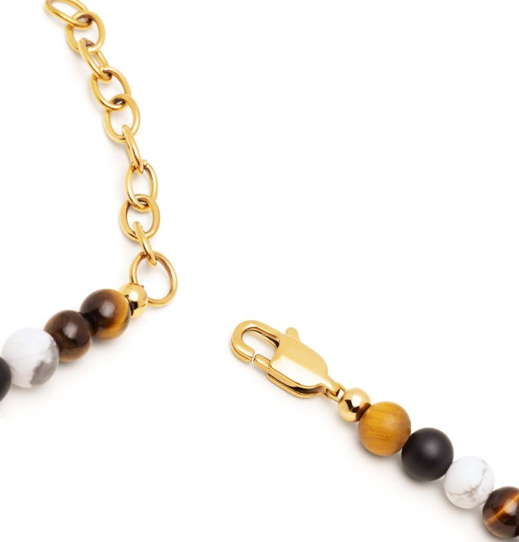 Beaded necklace featuring 4mm brown tiger eye, howlite, and onyx beads, crafted by T.M.J.