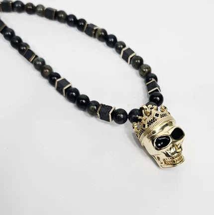 Large silver and gold plated skull with crown pendant on blue tiger eye beaded necklace, T.M.J beaded jewelry.