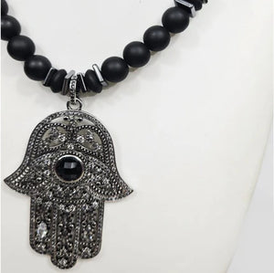 Large silver Hand of Hemsa pendant on Austrian crystal strand with matte onyx beads beaded necklace by T.M.J.