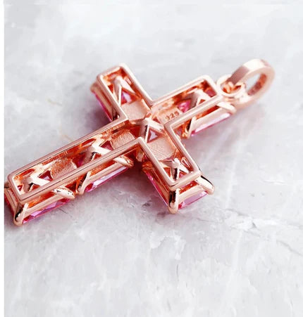 Serah beaded cross necklace by T.M.J featuring silver and rose gold plating with pink Austrian crystals.