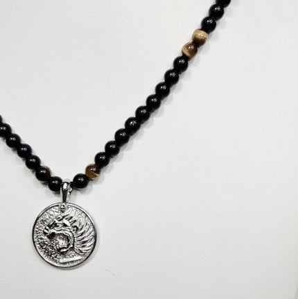 Stainless steel beaded necklace with Nemean Lion pendant inspired by Greek mythology, featuring detailed lion design and beaded chain.