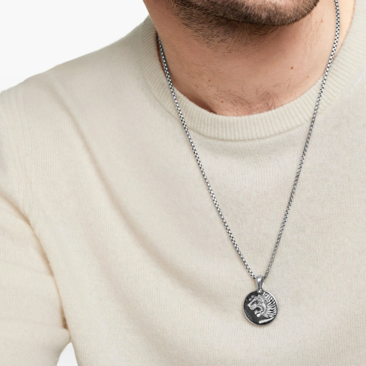 Stainless steel Nemean Lion pendant from T.M.J Greek mythology collection, featuring detailed lion design on a beaded necklace.
